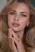 Stunning bridal soft glam makeup, and voluminous wedding hair styled by a Miami makeup artist and hair stylist