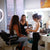 Professional makeup artist showing an eyeshadow palette to a student during an individual makeup lesson by Karysha Beauty