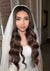 Classic bridal makeup look with glowing skin and neutral tones by a professional makeup artist in Miami