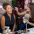 Professional makeup artist applying setting powder with a brush to a client during an individual makeup lesson by Karysha Beauty